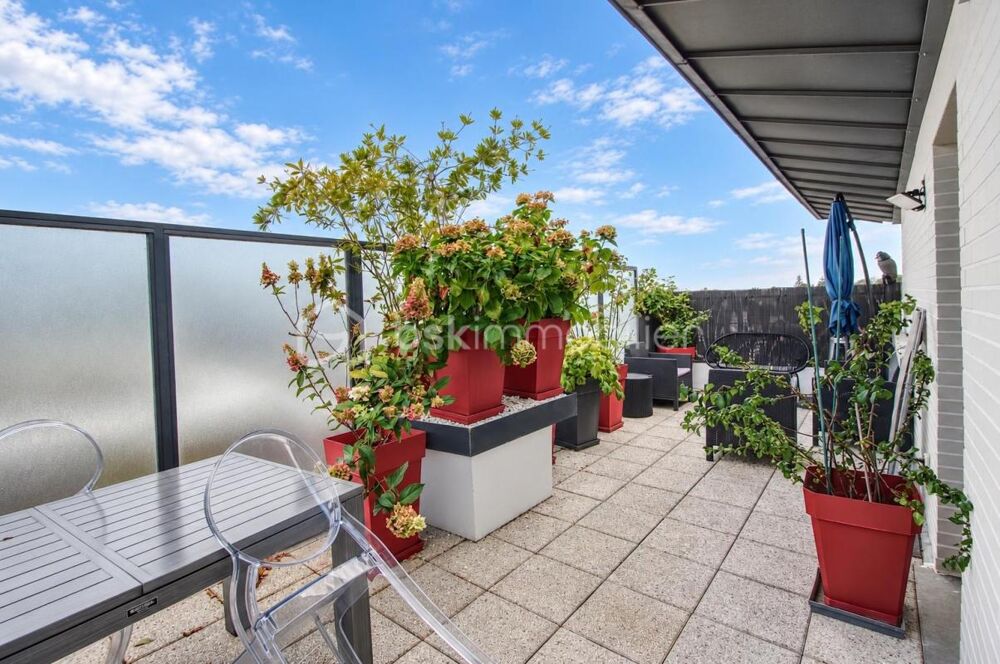 APPARTEMENT 3 PIÈCES AVEC 2 TERRASSES, PARKINGS ET CAVE