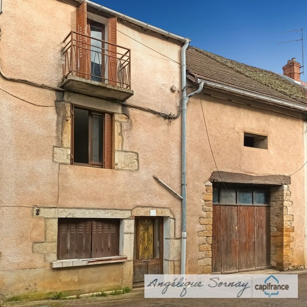 ? EXCLUSIVITÉ  Maison mitoyenne à fort potentiel de 229 m² sur 3 niveaux avec garage  Sellières