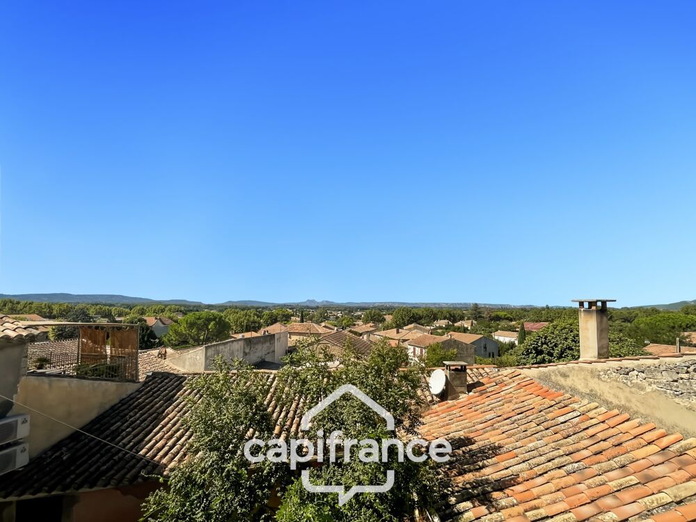 ne demeure de caractère au coeur de la Provence : 242 m2 de superficie habitable , une TERRASSE PANORAMIQUE. Distribution sur 3