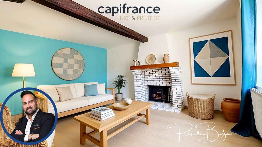 Maison à vendre 4 pièces SAINT GENIS LES OLLIERES (69)  Le charme d'une maison de village avec cour intimiste, garage et vie à