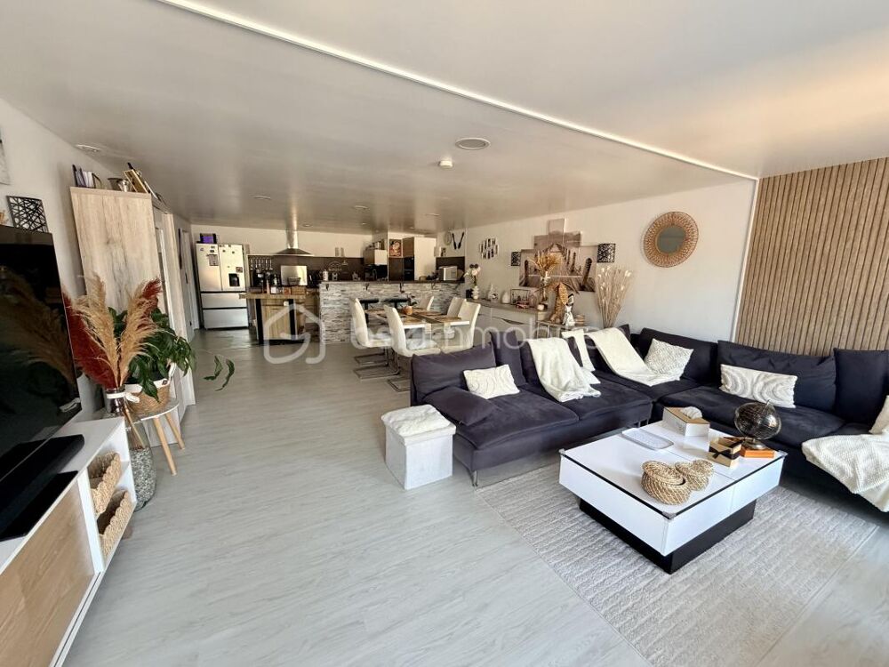 Maison mitoyenne de plain-pied de 95 m² avec terrasse à découvrir