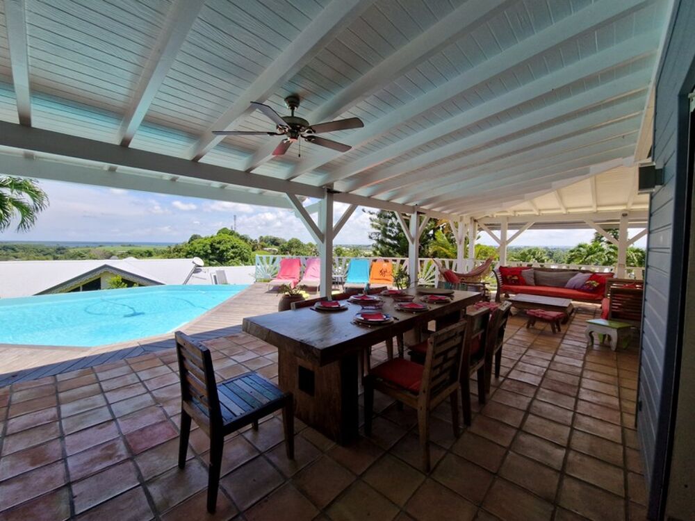 Vente Villa VUE MER Superbe villa de standing + T3 piscine à débordement sur 1000 m² à BAIE MAHAULT (971) Baie mahault