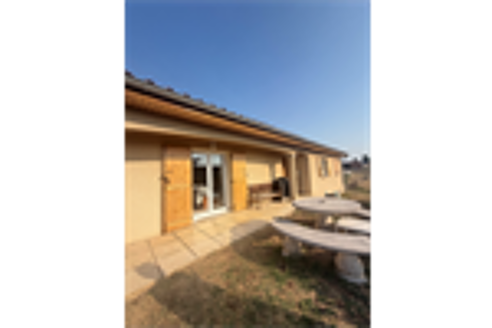 Maison familiale de 112 m² avec 4 chambres, grand garage et jardin