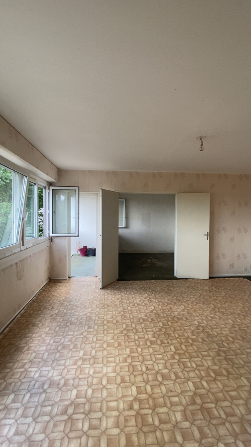 Appartement à rénover de 67 m2 habitables proche centre ville