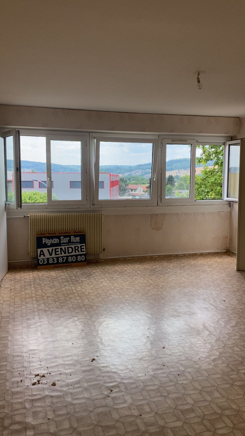Appartement à rénover de 67 m2 habitables proche centre ville