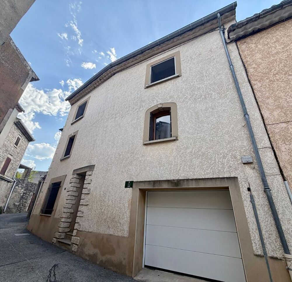 Maison de village avec garage et balcon au coeur de Saint-Jean-de-Maruéjols