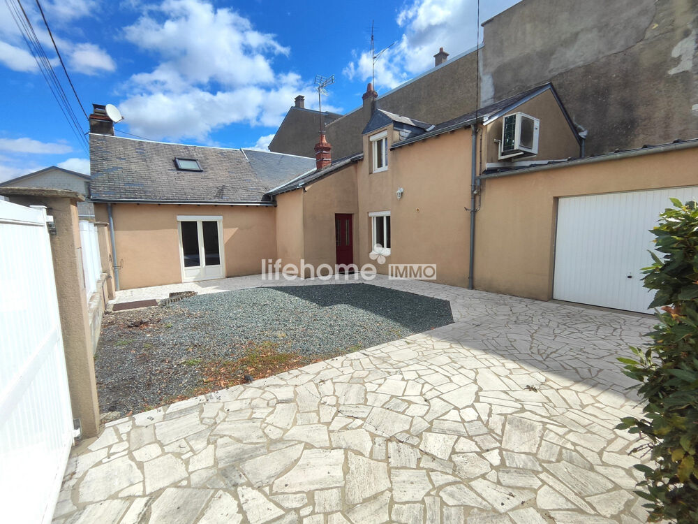 Maison avec garage et jardin
