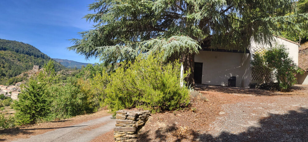 ne maison de plain-pied au calme, avec 1 500 m² de terrain arboré un véritable havre de paix à 5 minutes de Caunes-Minervois !