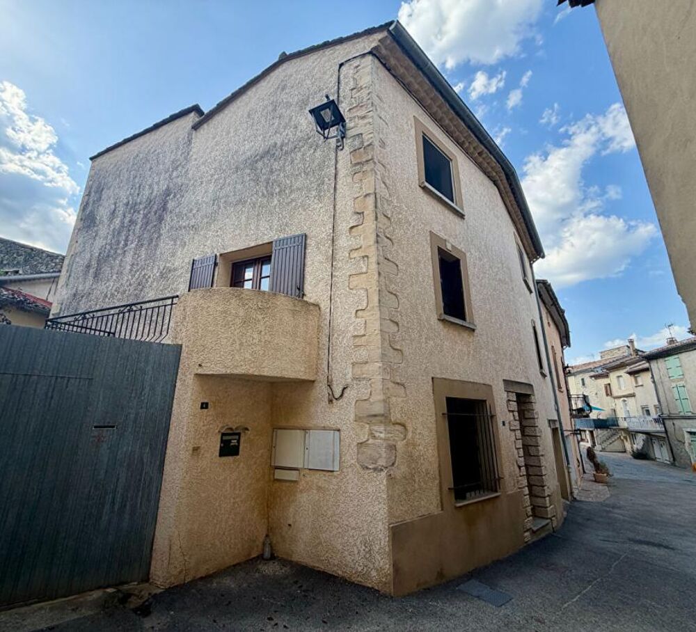 Maison de village avec garage et balcon au coeur de Saint-Jean-de-Maruéjols