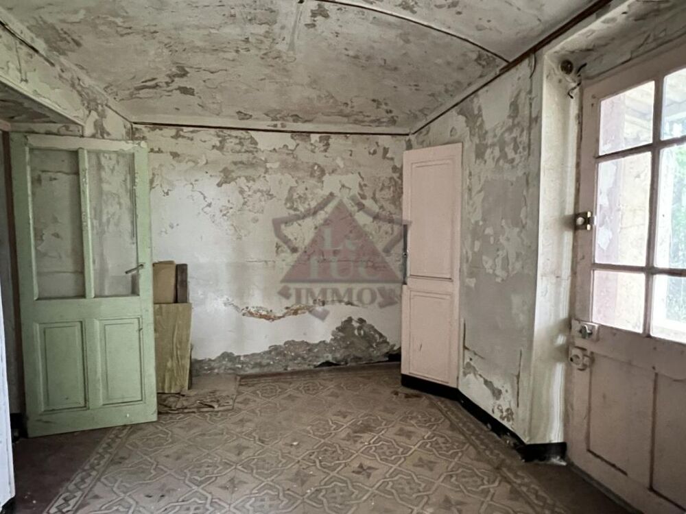 MAISON A RENOVER SUR UN GRAND TERRAIN