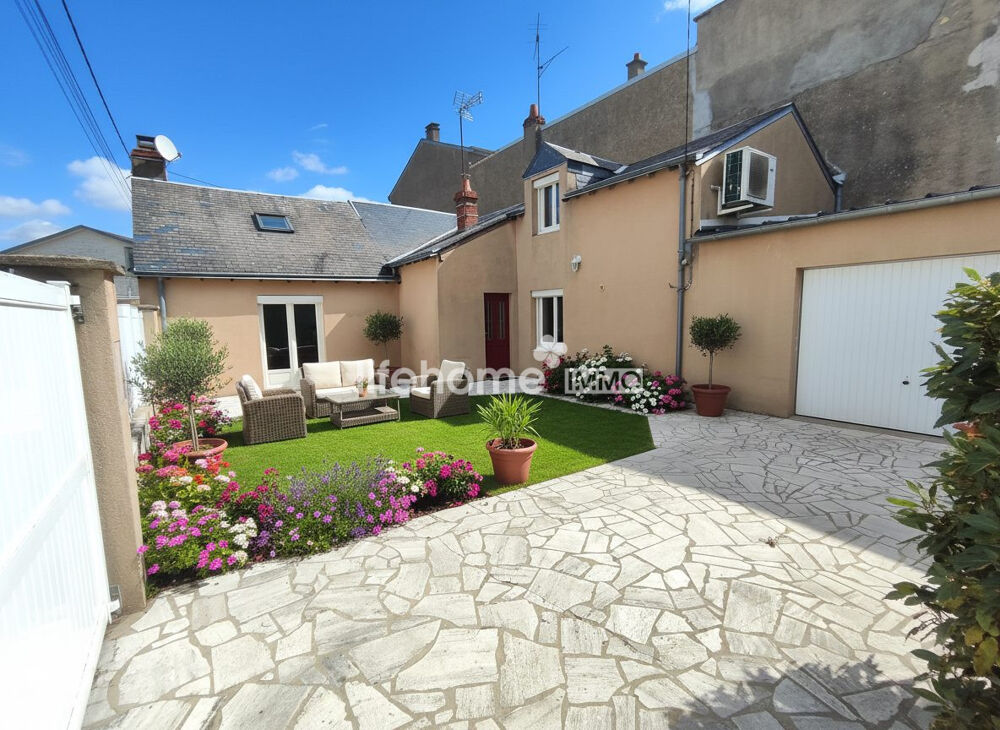 Maison avec garage et jardin