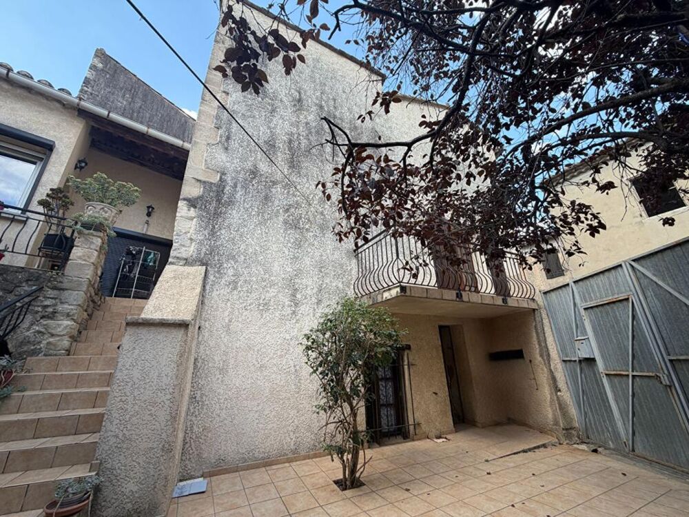 Maison de village avec garage et balcon au coeur de Saint-Jean-de-Maruéjols