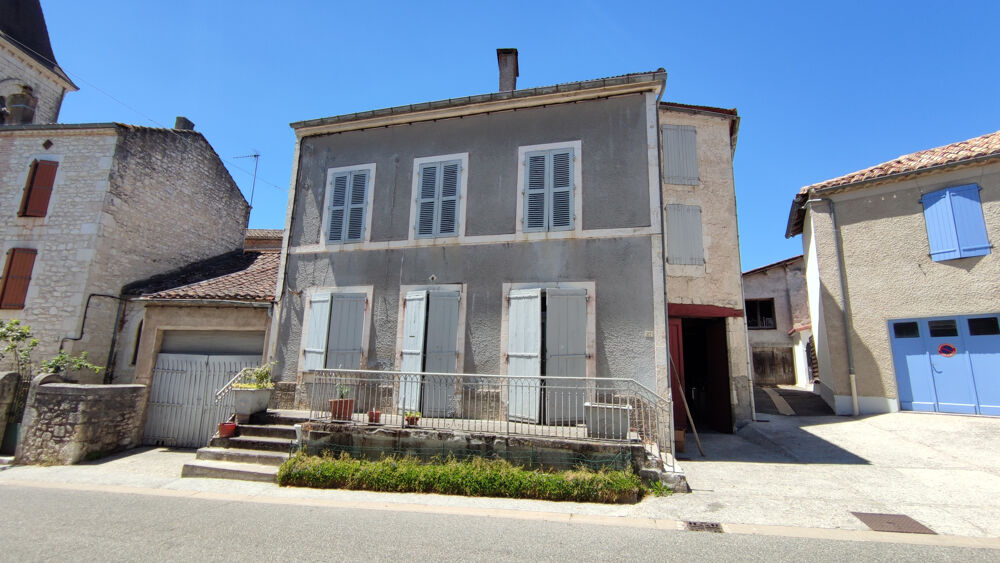 Maison de village en pierre avec jardin, garage et atelier