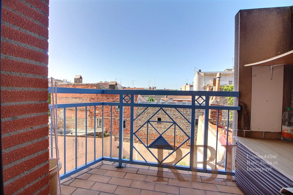 Appartement T2 - balcons et parking