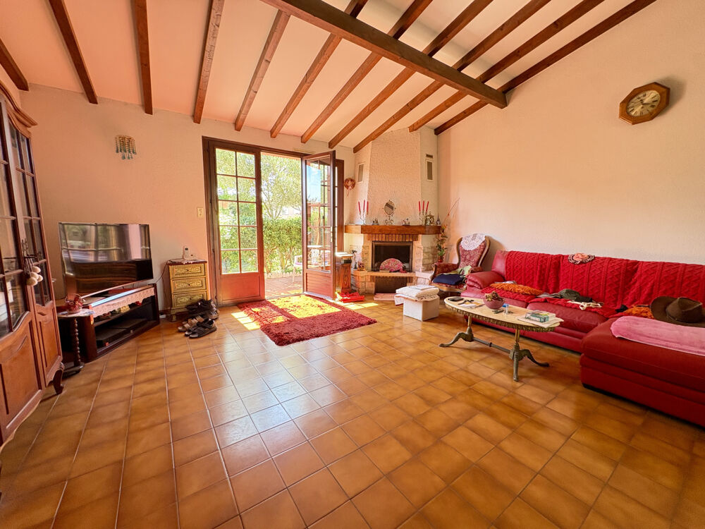 Maison 2 faces sur terrain arboré de 342 m2