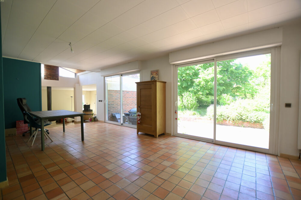 Ensemble immobilier aux portes d'Auxerre avec habitation familiale, parc arboré et revenu locatif