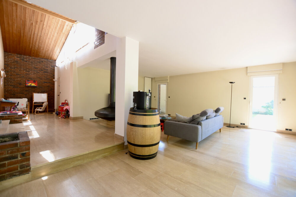 Ensemble immobilier aux portes d'Auxerre avec habitation familiale, parc arboré et revenu locatif