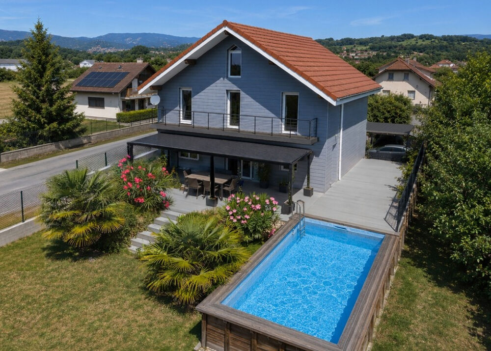 Maison familiale contemporaine de 170 m2 avec piscine, garage et grand sous-sol sur 900 m2