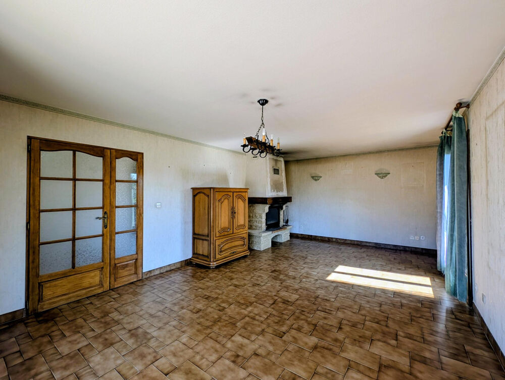Maison plain pied en centre village