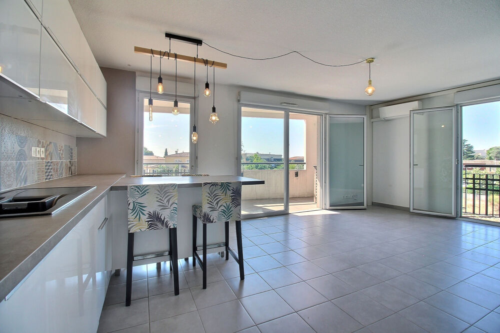 À vendre, Les Grisettes, appartement 3 pièces de 66 m2 avec terrasse et parking en sous-sol.