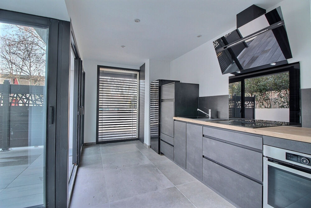 LOFT T2 bis 73 m2 + terrasse + parking