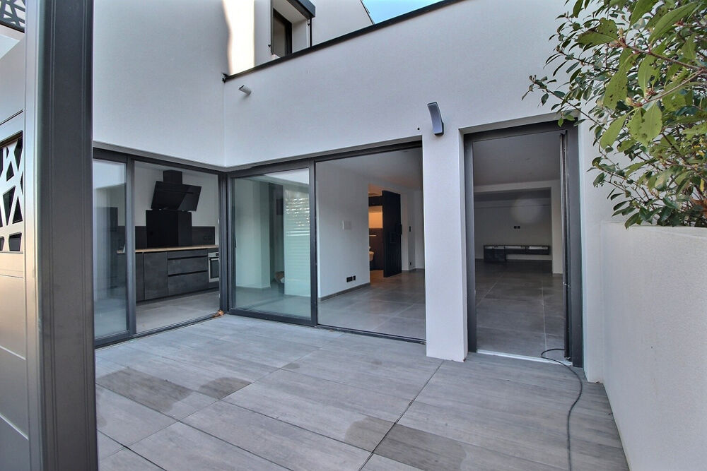 LOFT T2 bis 73 m2 + terrasse + parking