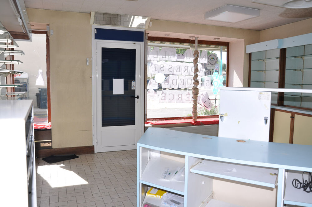 Bel immeuble à usage de local commercial et appartement en duplex
