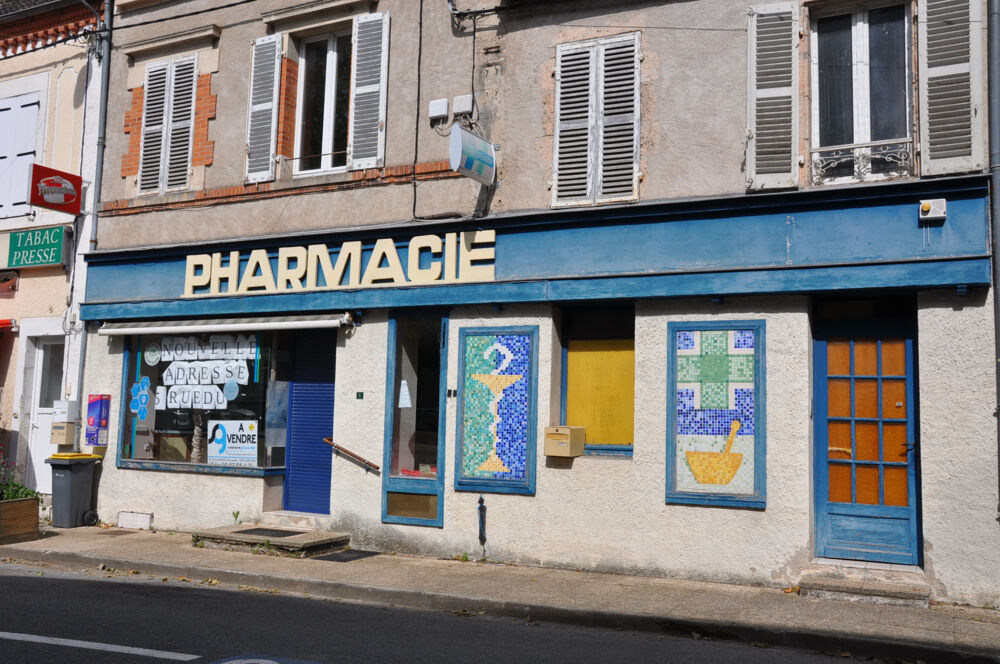 Bel immeuble à usage de local commercial et appartement en duplex