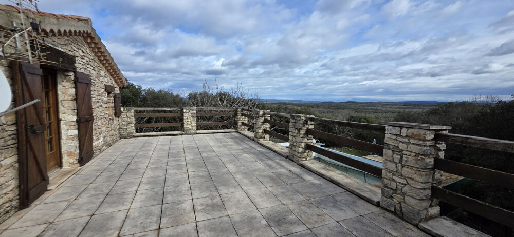 Maison en pierre avec vue panoramique et piscine entre Uzés et Barjac