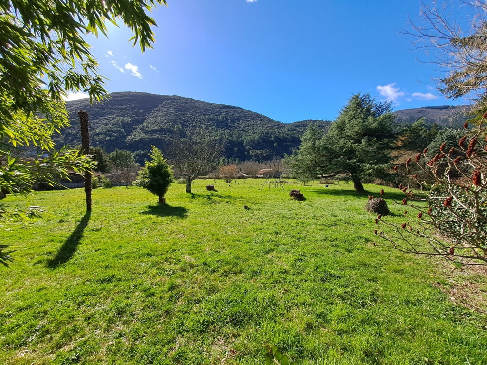 Vente Maison Lot : maison de 3 appartements et terrain constructible de 7000 m2 St florent sur auzonnet