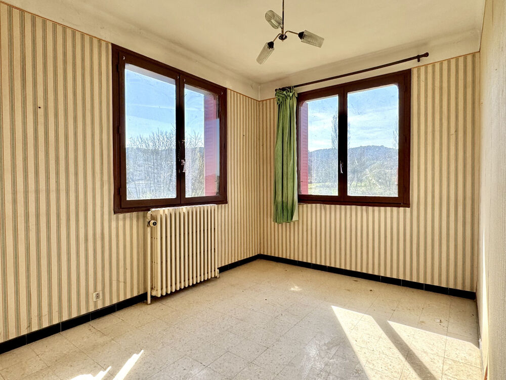 Spécial investisseur :Maison individuelle sur terrain divisible et constructible