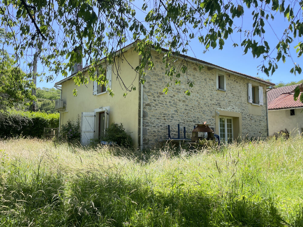 Vente Maison DANS UN ENDROIT VERDOYANT, ANCIENNE GRANGE EN PIERRE CONVERTIE EN HABITATION AVEC TERRAIN Manot