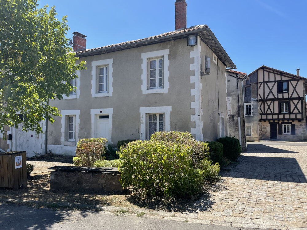 CENTRE BOURG, MAISON AVEC GARAGE ET JARDIN SÉPARÉ