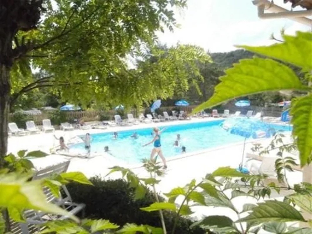   Camping La Castillonderie - Eco 3 Pices 4 Personnes Piscine collective - Terrasse - place de parking en extrieur - Accs Inter Aquitaine, Thonac (24290)