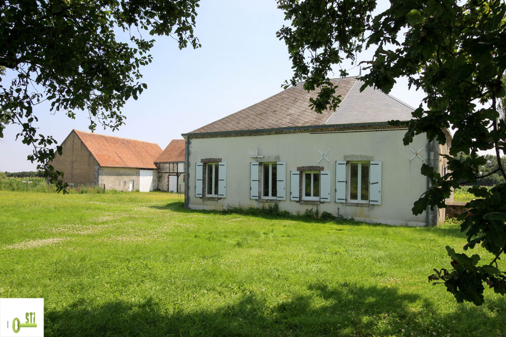 Maison avec grandes dépendances