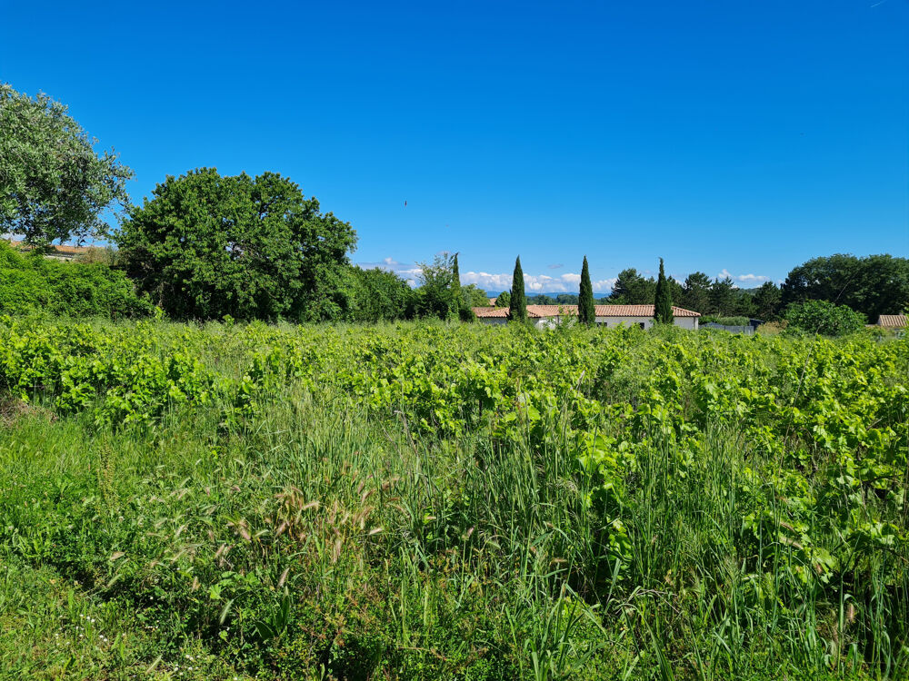 Ensemble immobilier avec piscine et terrain constructible