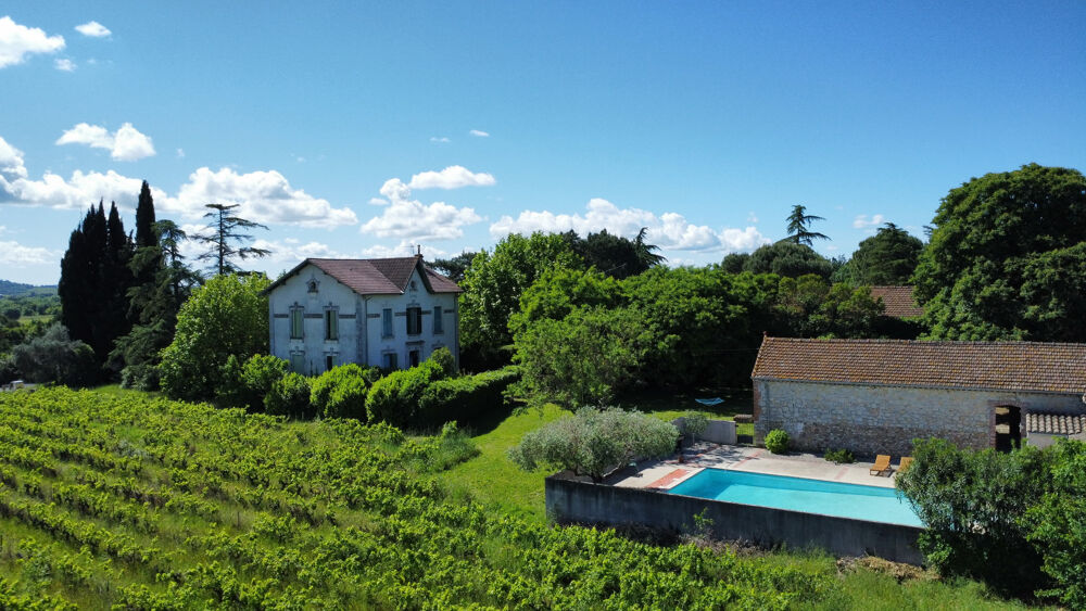 Ensemble immobilier avec piscine et terrain constructible