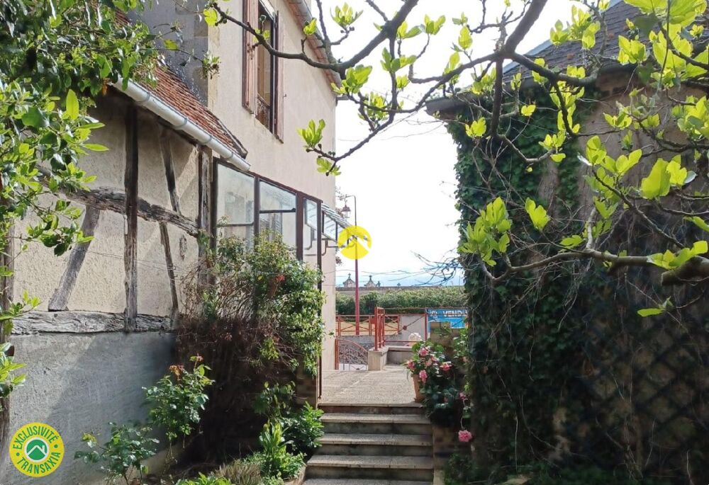 2 maisons avec garage et jardin