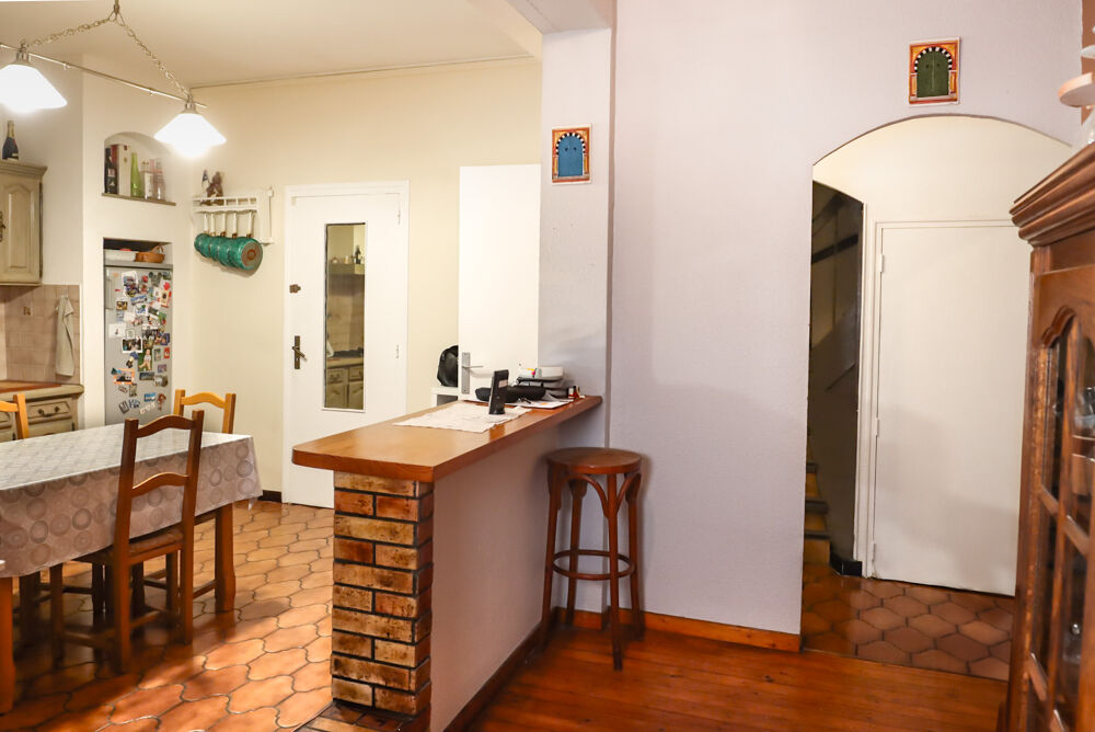Rue Trivalle : Grand appartement + Local commercial avec garage Idéal investissement ou activité indépendante