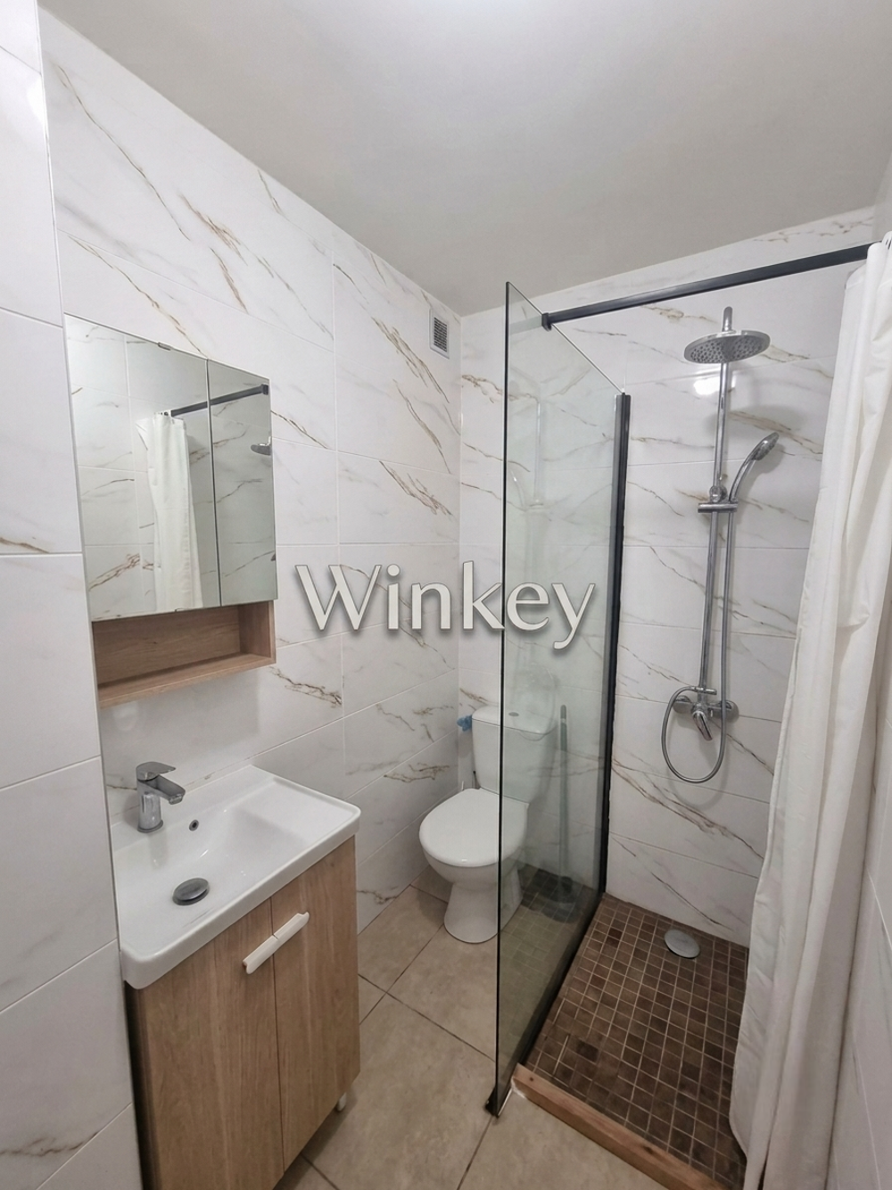 Appartement T1 Bis + Jardin et place de parking