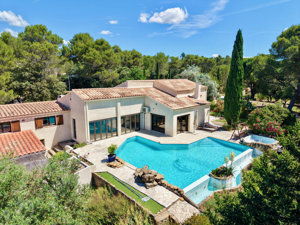 Nathalie SINARD vous présente cette PROPRIÉTÉ DEXCEPTION À UCHAUX DEUX HABITATIONS, PISCINE À DÉBORDEMENT,