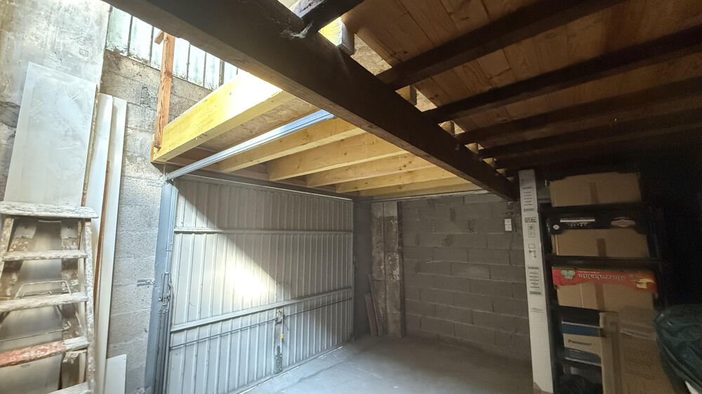 Garage avec espace stockage en mezzanine