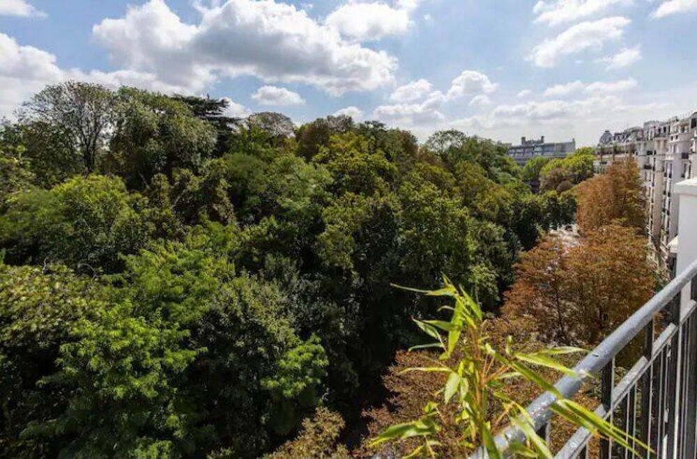 Location Appartement 50m² - Face au Parc des Buttes Chaumont Paris 19