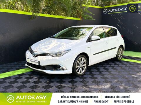 Toyota Auris Hatchback 1.8 VVT-i HSD CVT 2016 occasion Saint-Paul 97460