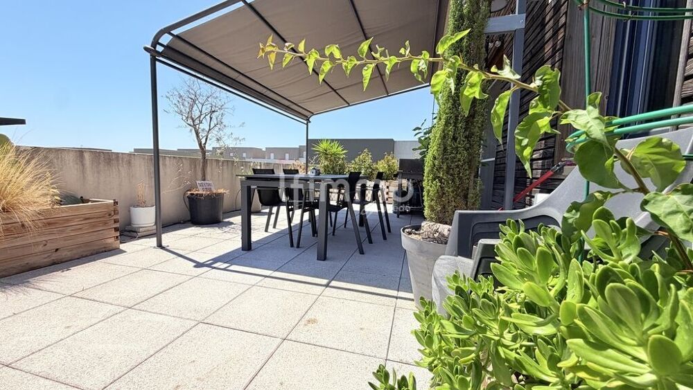 Appartement T4 duplex 2 terrasses de 37 m² et garage fermé