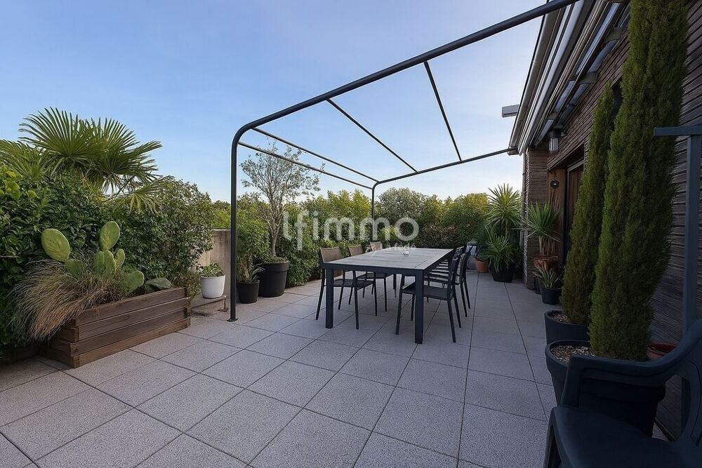 Appartement T4 duplex 2 terrasses de 37 m² et garage fermé