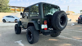 Wrangler 4.0L 177CV Edition Sahara 1998 occasion 30620 Bernis