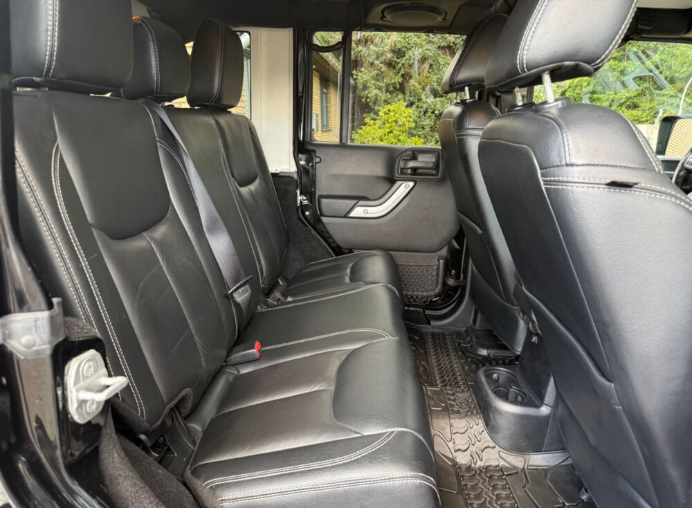 Wrangler 2.8 CRD 200 Unlimited Sahara BLACK BEAUTY 2014 occasion 85600 Montaigu