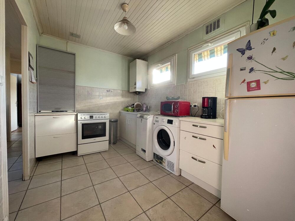 Maison familiale avec 4 chambres, grand garage et terrai....
