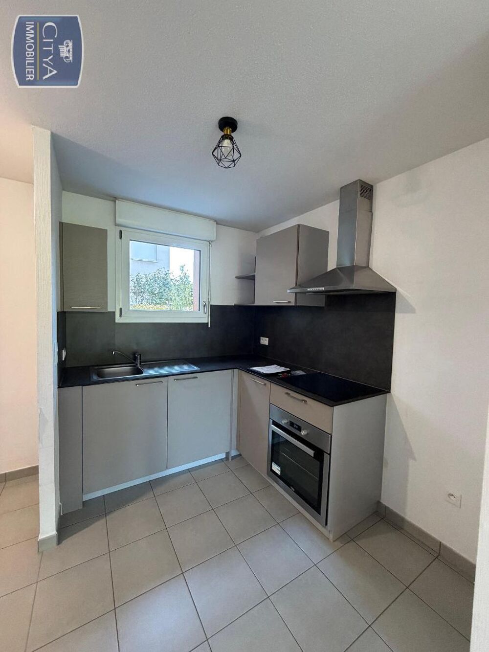 APPARTEMENT 2 PIÈCES AVEC TERRASSE - RUE D'OSTWALD En lo....